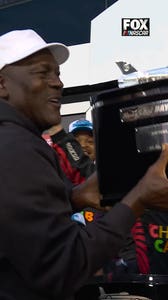 MJ ecstatic after his driver’s win — championship energy all around. 🏁🔥