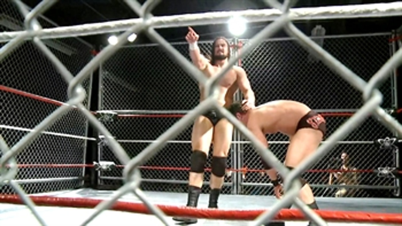 Drew McIntyre launches Roderick Strong into the cage: The Greatest Independent Steel Cage Matches (WWE Network Exclusive)
