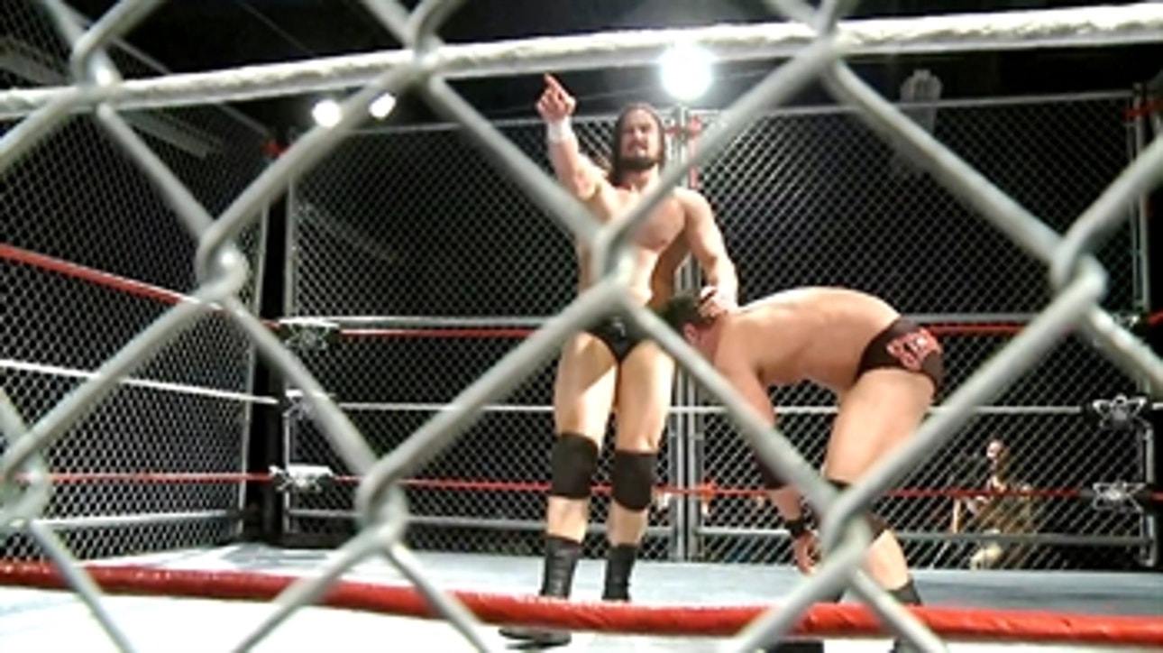 Drew McIntyre launches Roderick Strong into the cage: The Greatest Independent Steel Cage Matches (WWE Network Exclusive)