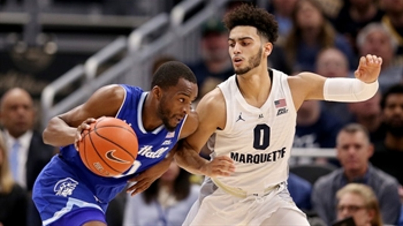 Howard's 26 points help No. 21 Marquette hold off Seton Hall 70-66