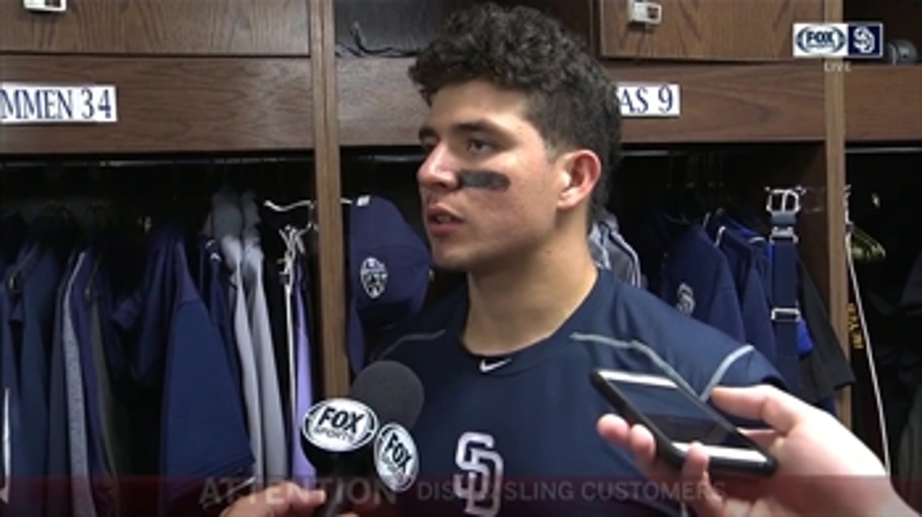Luis Urias talks after his first game back in the big leagues