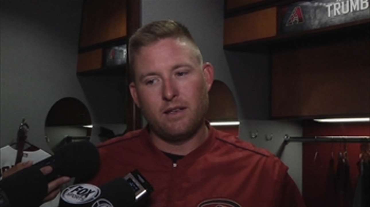 Mark Trumbo tips cap to Chris Heston