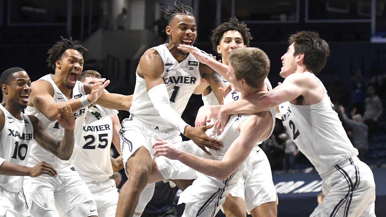 Adam Kunkel hits a three at the buzzer to give Xavier the win over Marquette, 91-88