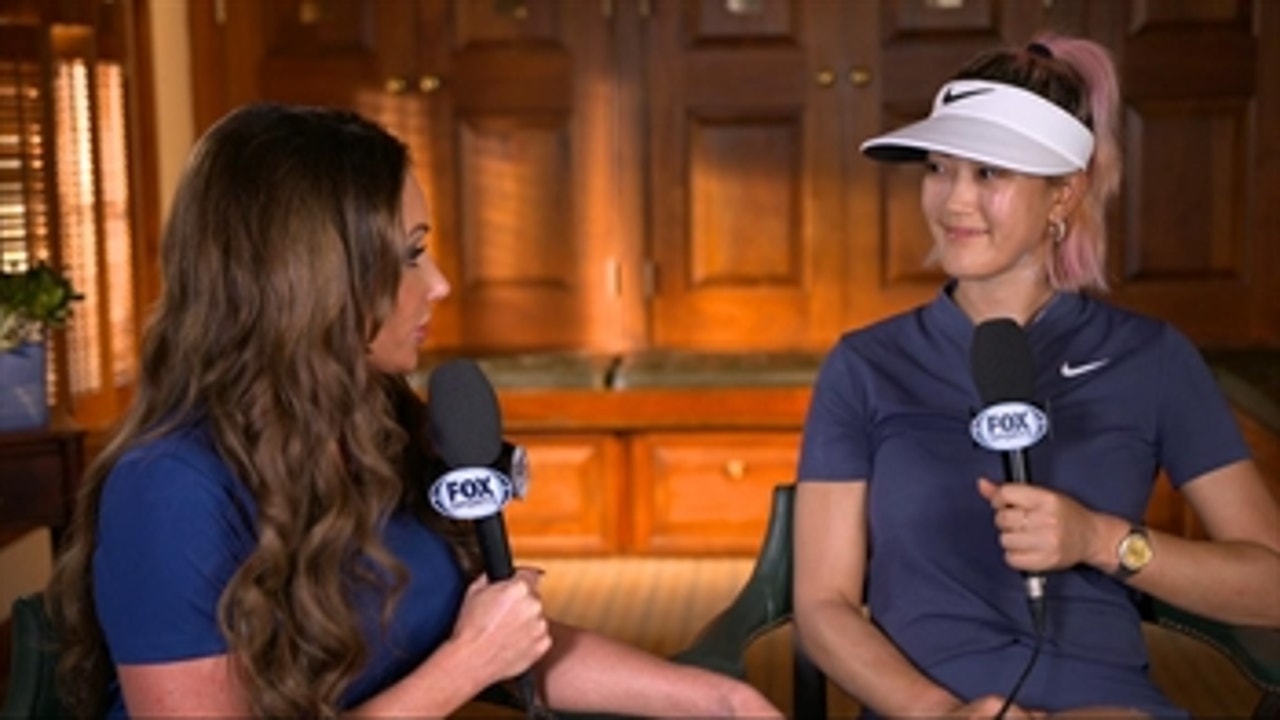 Michelle Wie talks with Holly Sonders after the opening day of the US Women's Open