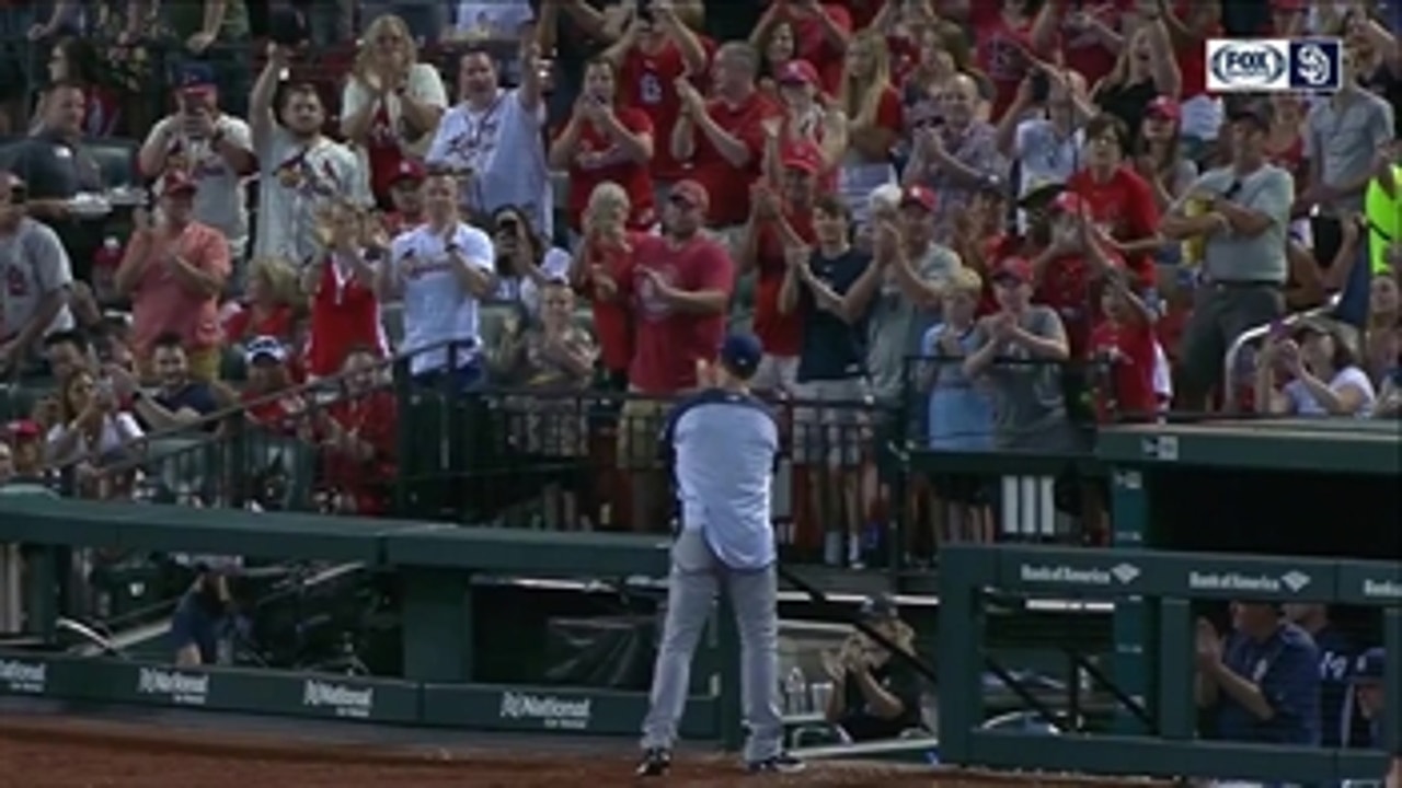 Mark McGwire given a standing ovation by the St. Louis crowd