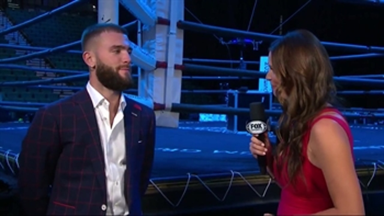 Caleb Plant talks with Heidi Androl before his press conference with Mike Lee