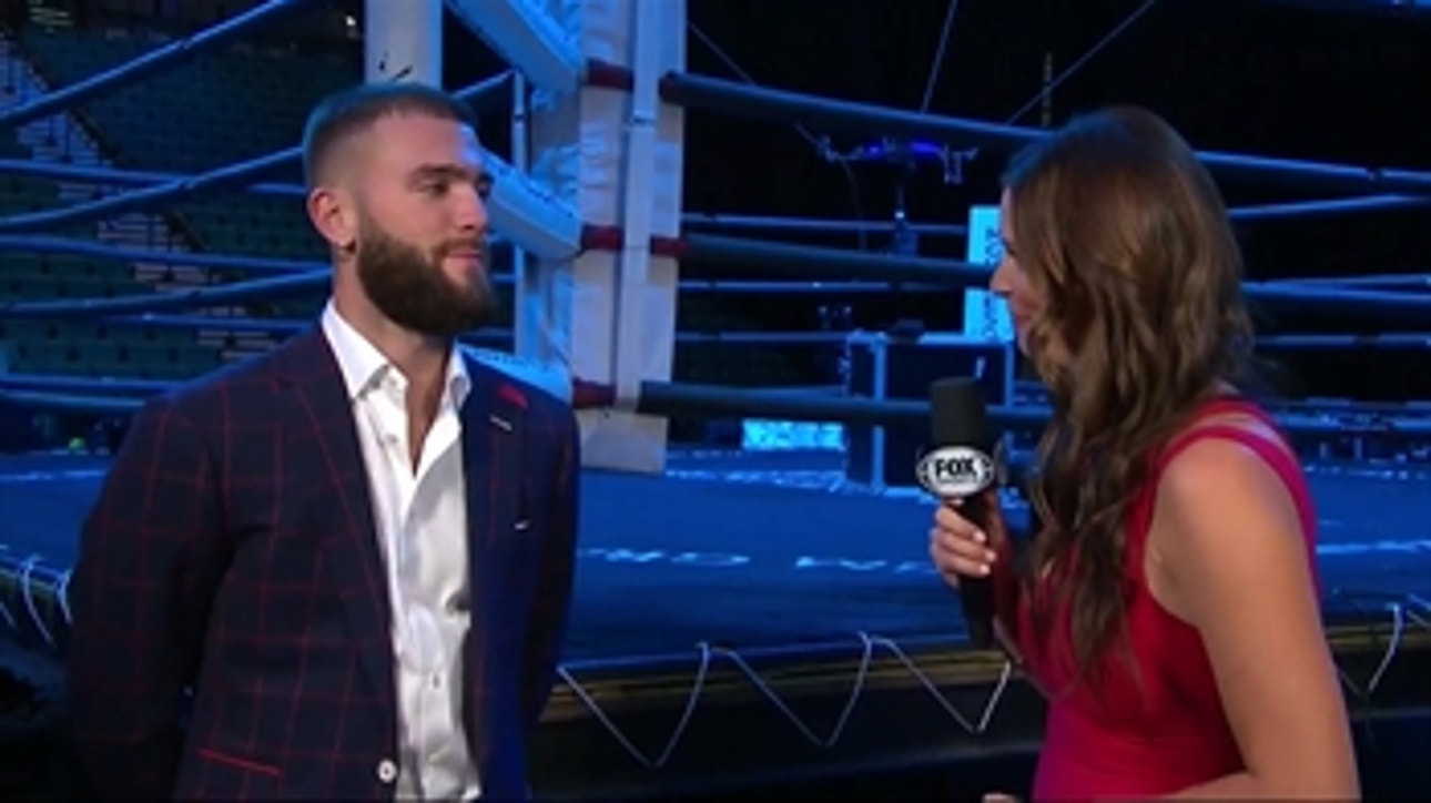 Caleb Plant talks with Heidi Androl before his press conference with Mike Lee