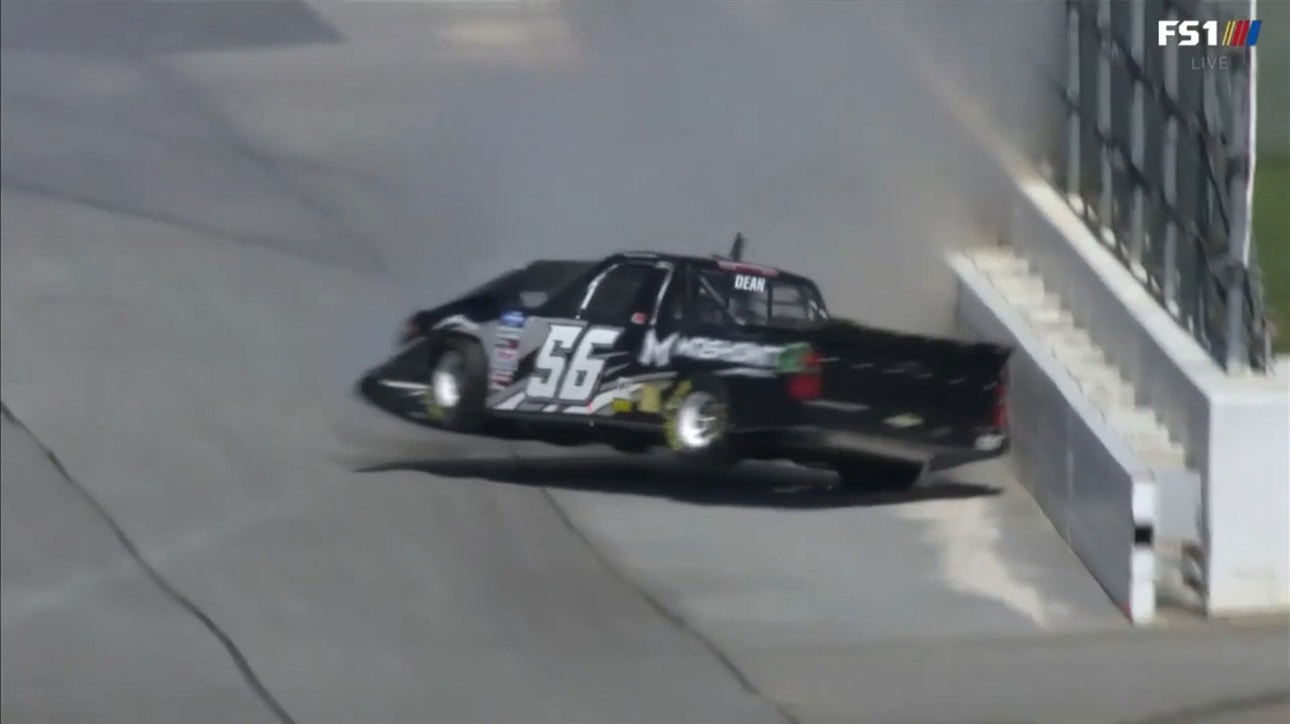 Gus Dean slams the wall after contact with Tanner Gray off turn 4