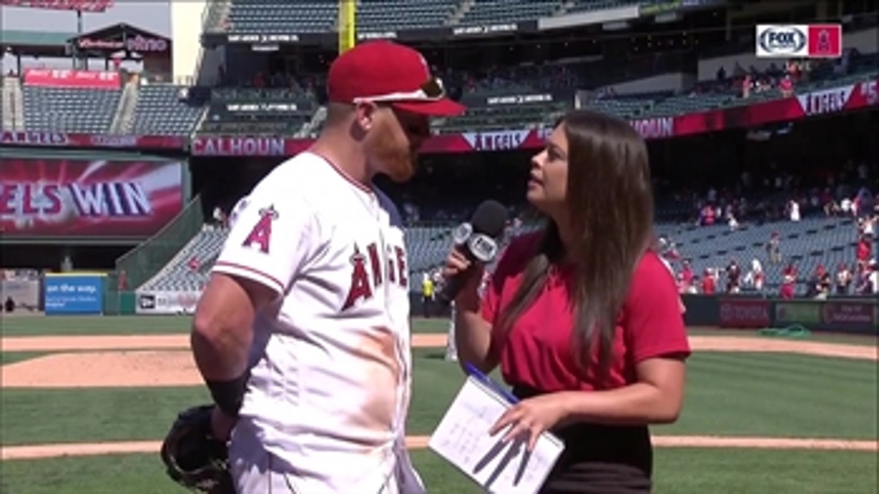 Cole Kalhoun talks with Alex Curry after the Angels complete the sweep of the Detroit Tigers