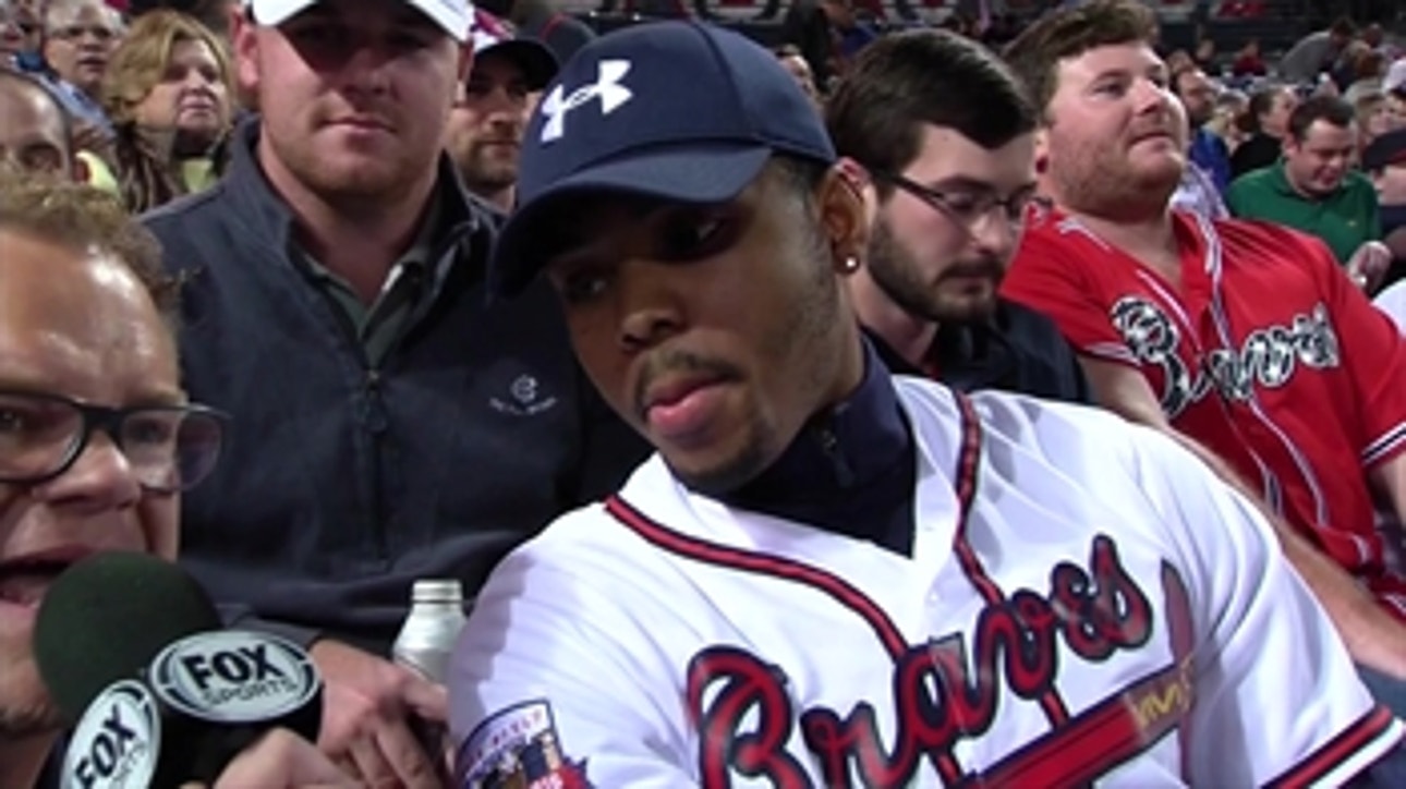 Hawks' Bazemore takes in April in the ATL at Braves game