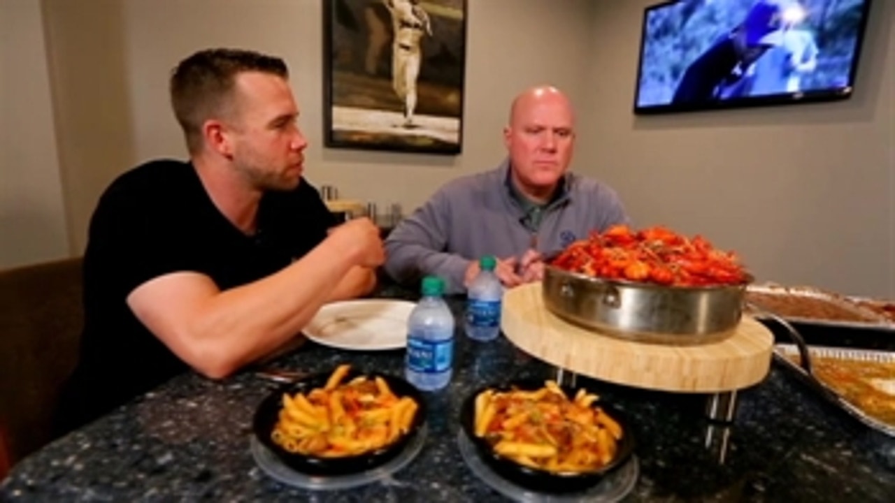 Ryan Schimpf shows Mark Grant how to properly eat some Louisiana home cooking