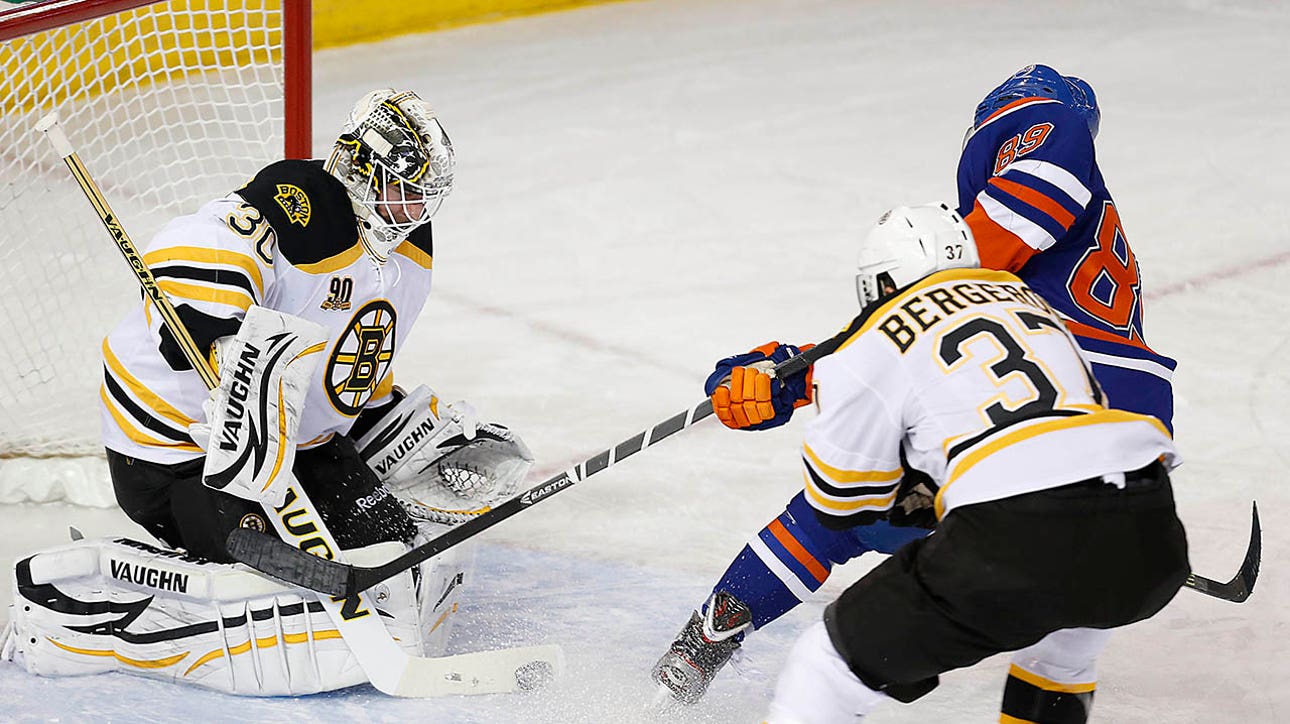 Johnson helps Bruins hold off Oilers