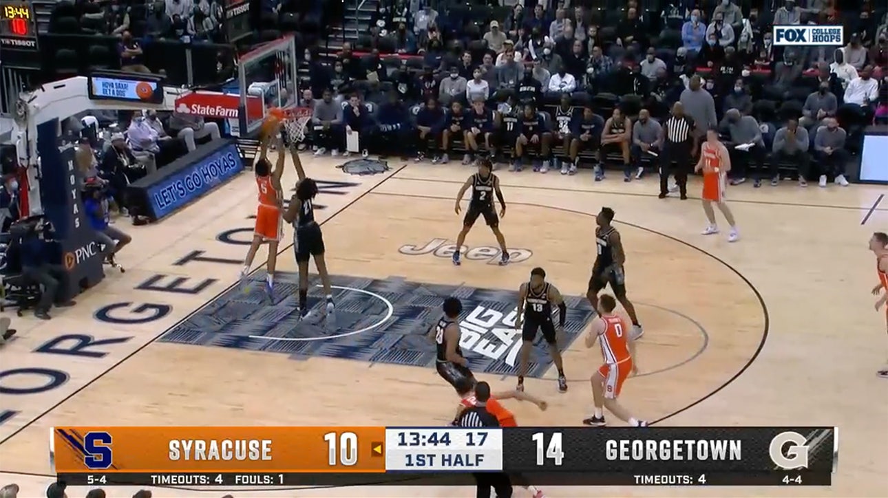 Syracuse's Frank Anselem throws down a monster poster dunk on Ryan Mutombo