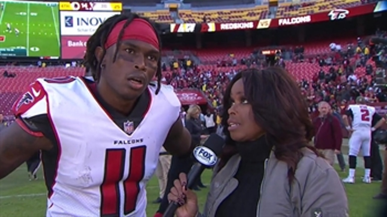 Pam Oliver talks to Julio Jones after Falcons win over Redskins