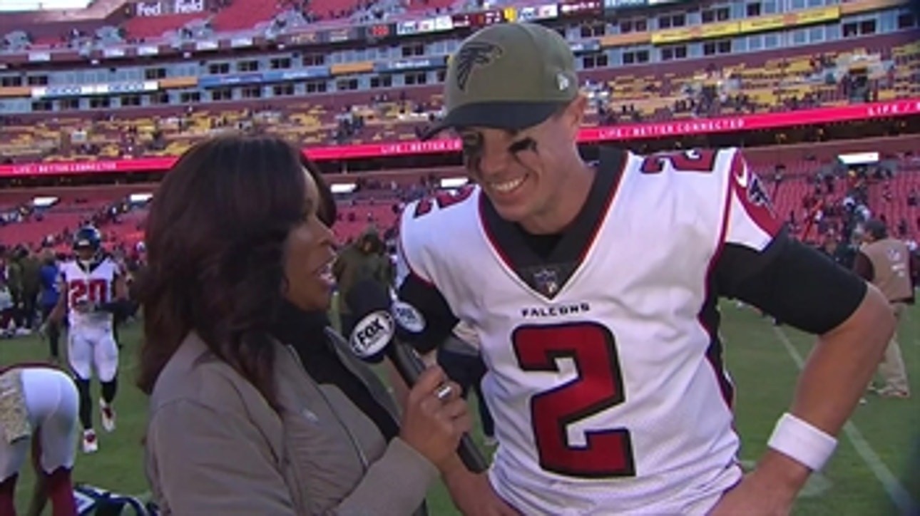 Pam Oliver talks with Matt Ryan after Falcons win over Redskins