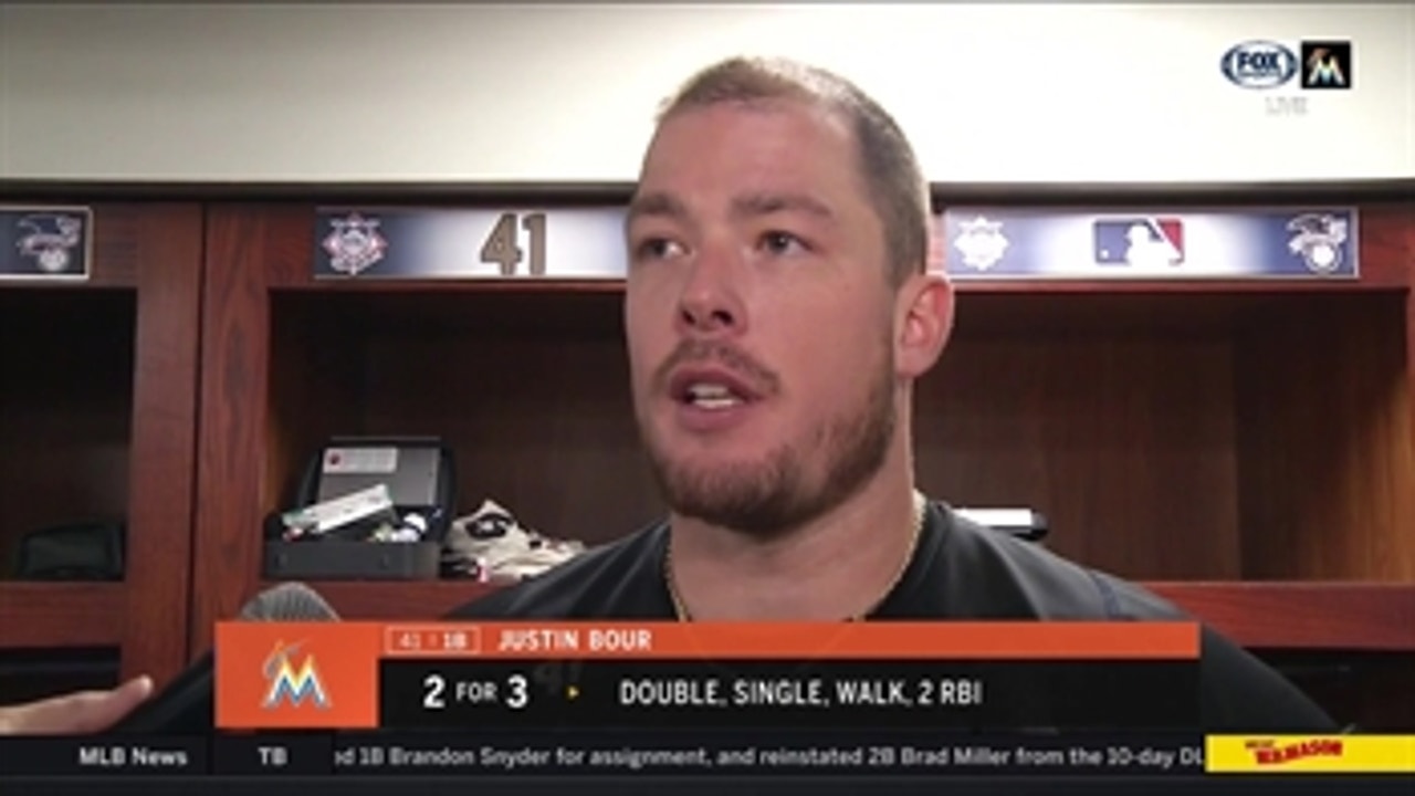 Justin Bour: 'I would much rather go 0 for 4 with 4 strikeouts than commit an error on the bases'
