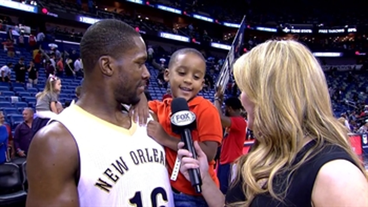 Toney Douglas celebrates win on-court with his son