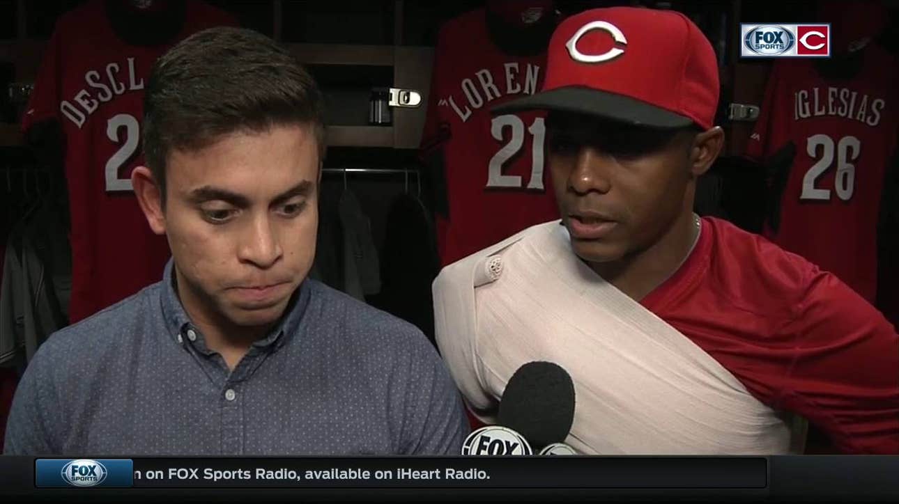 Raisel Iglesias works out of two jams in Reds win
