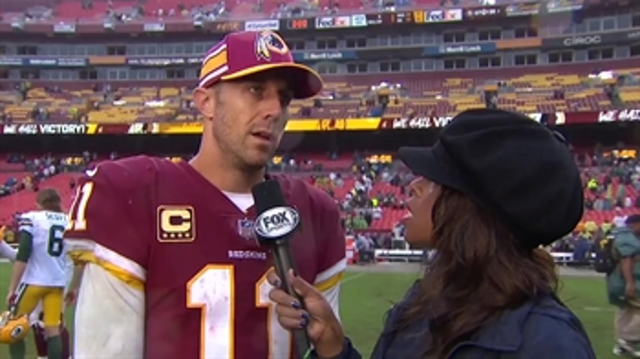 Alex Smith catches up with Pam Oliver after a big win