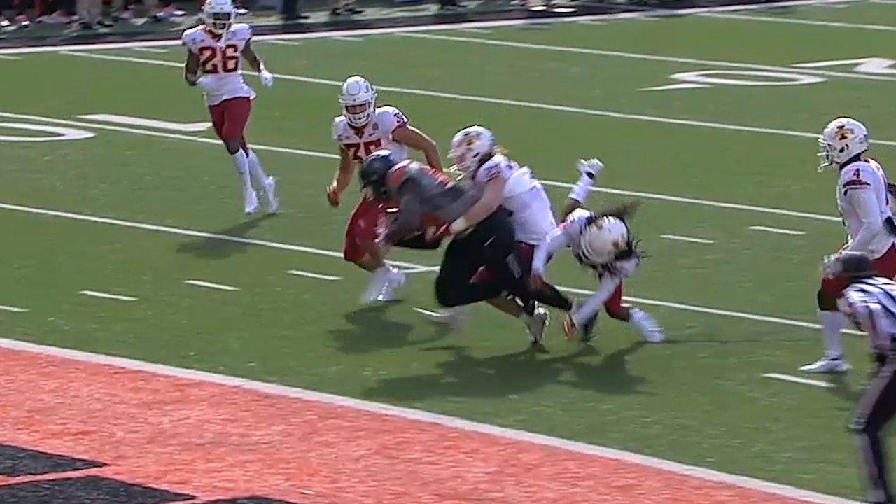 Oklahoma State's Spencer Sanders connects with Jelani Woods for 34