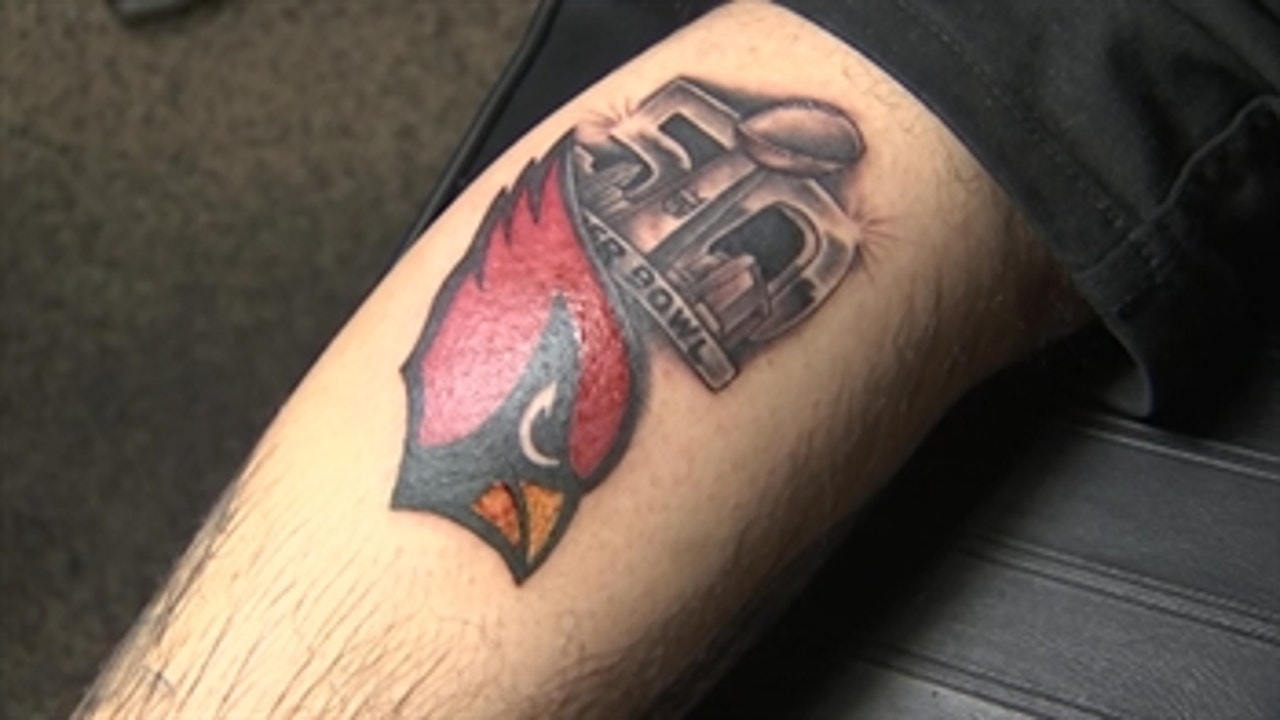 Broncos fan celebrates titles with epic full arm tattoo
