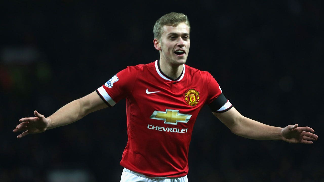Wilson extends Manchester United lead