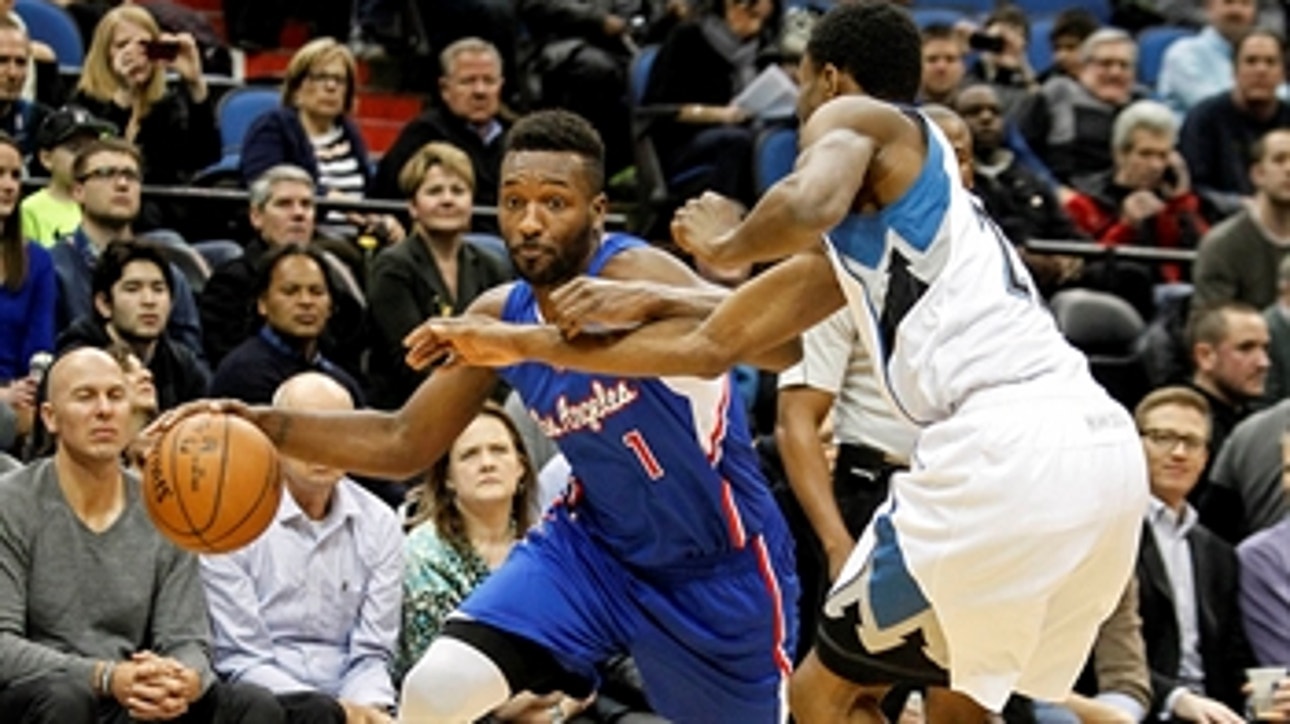 Clippers edge past Wolves