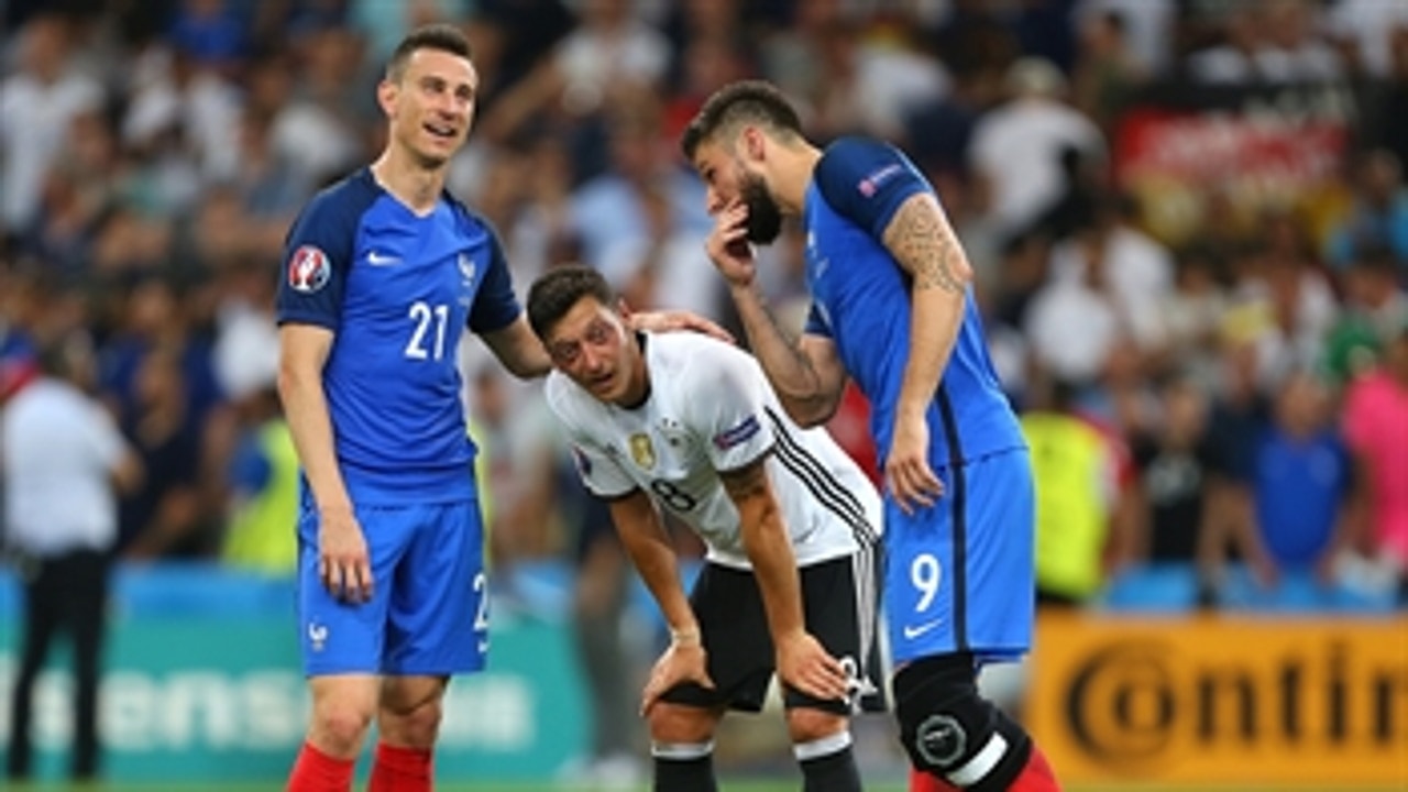 French players comfort German players after loss