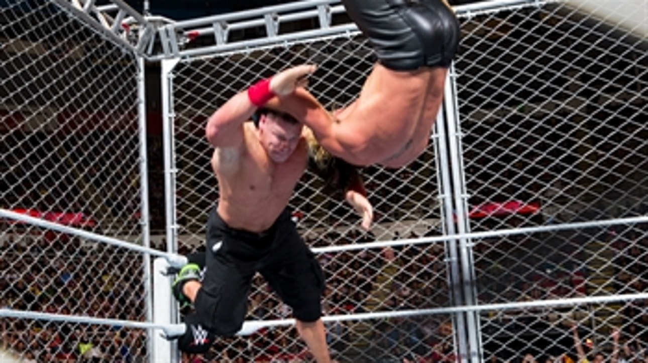 John Cena and Seth Rollins collide inside a steel cage: Raw, Dec. 15, 2014