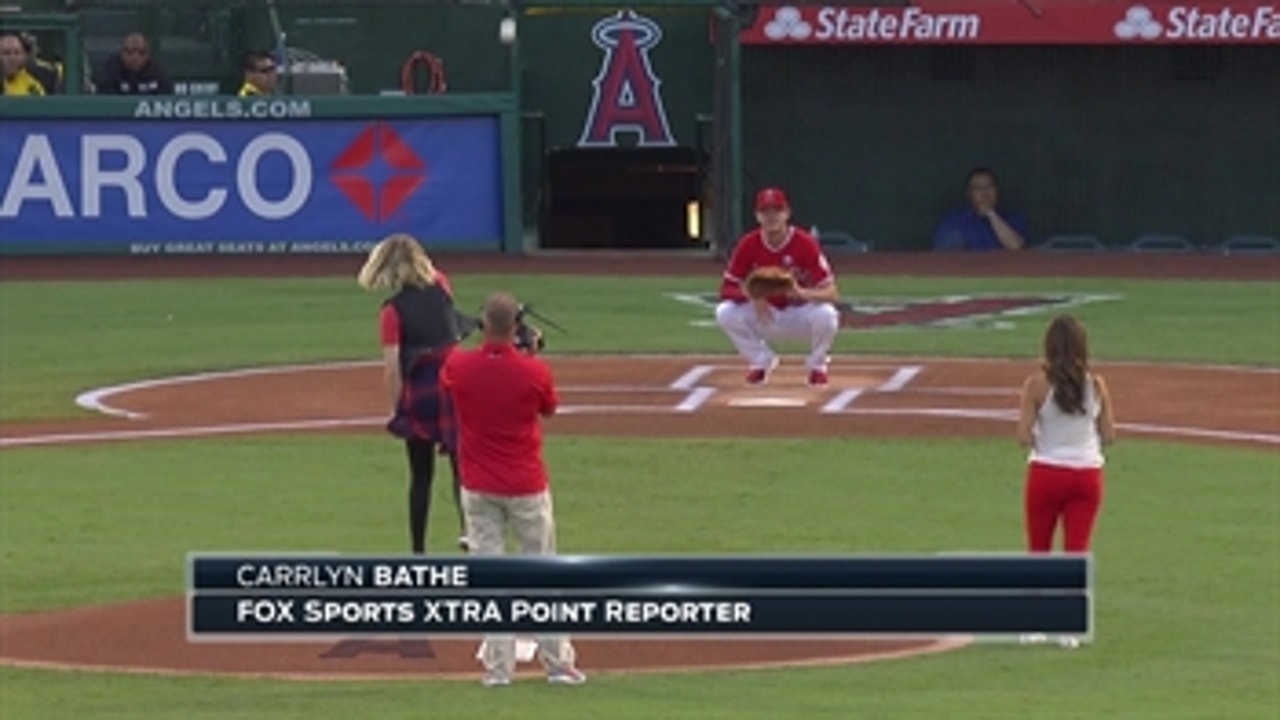 XTRA Point's Carrlyn Bathe, Taylor Felix throw out first pitch at Angels Game
