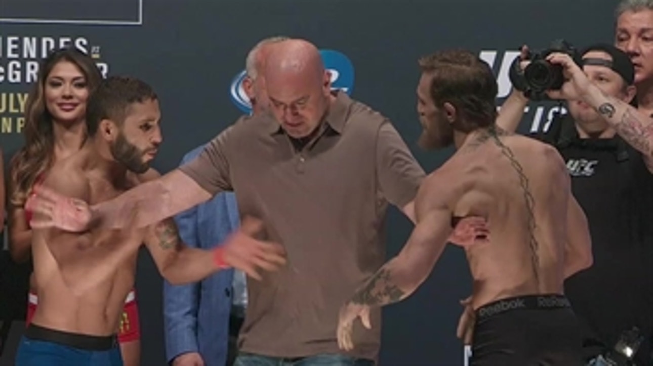 Conor McGregor and Chad Mendes weigh in for UFC 189