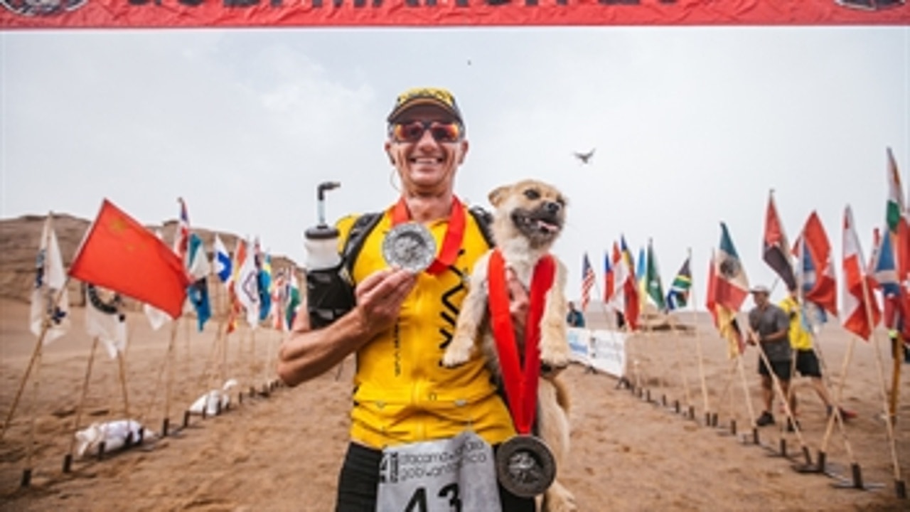 This stray dog ran aside an ultra-marathon runner and they're now best buds