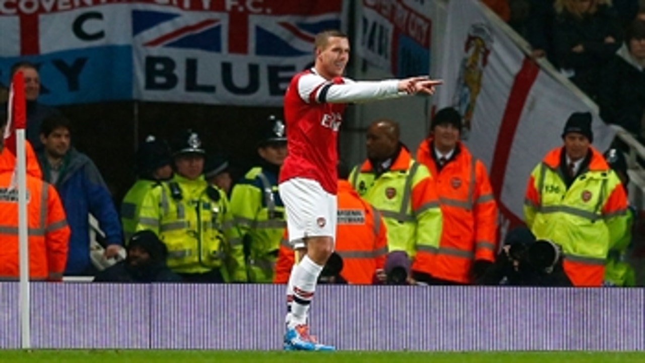 Podolski adds to Arsenal lead
