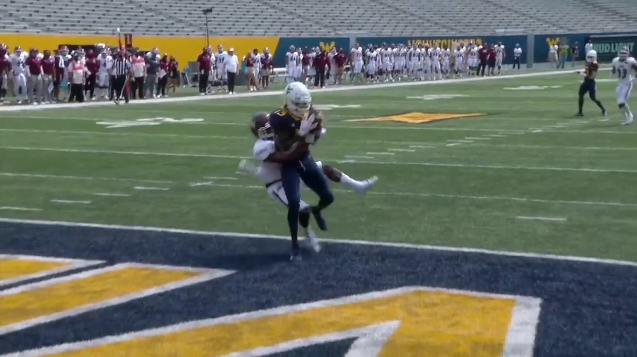 Jarrett Doege throws 32-yard strike to Sam James, WVU takes 21-0 lead.