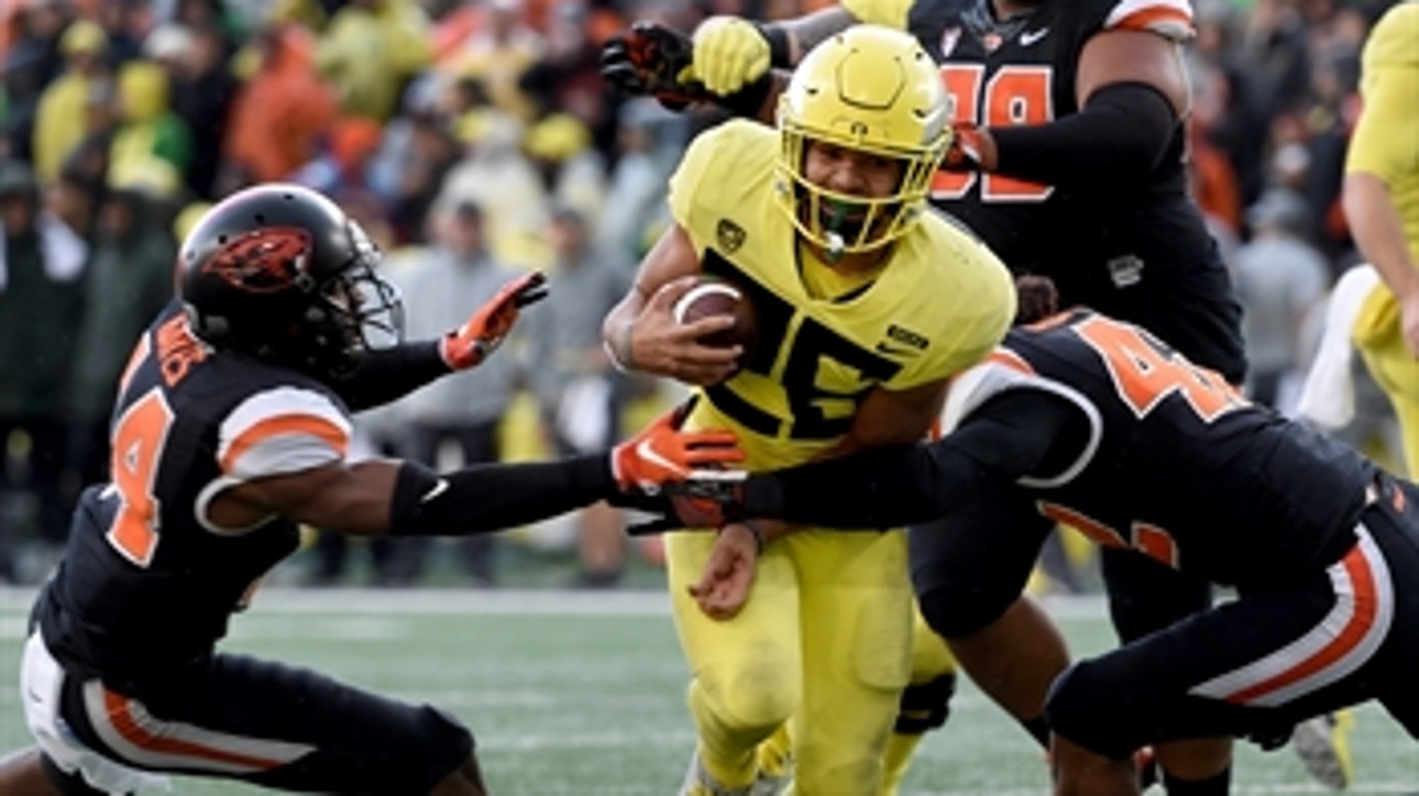 Oregon rolls over Oregon State 55-15