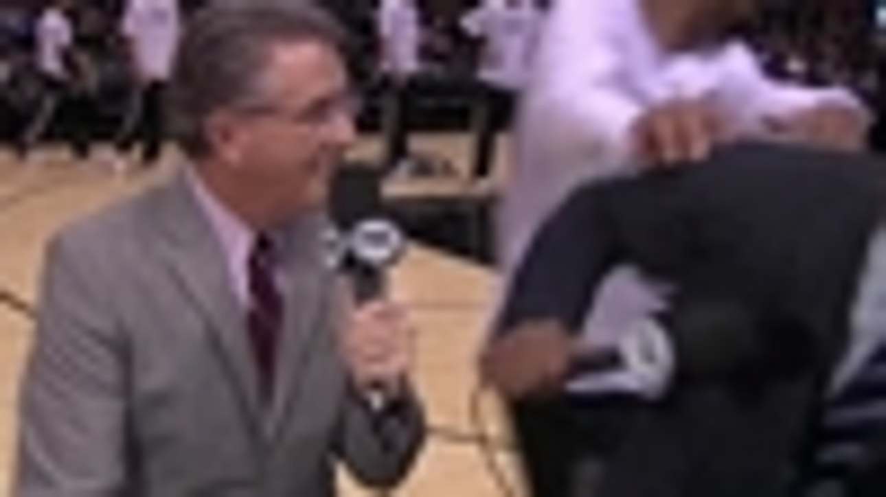 Tim Duncan knocks over Spurs announcer