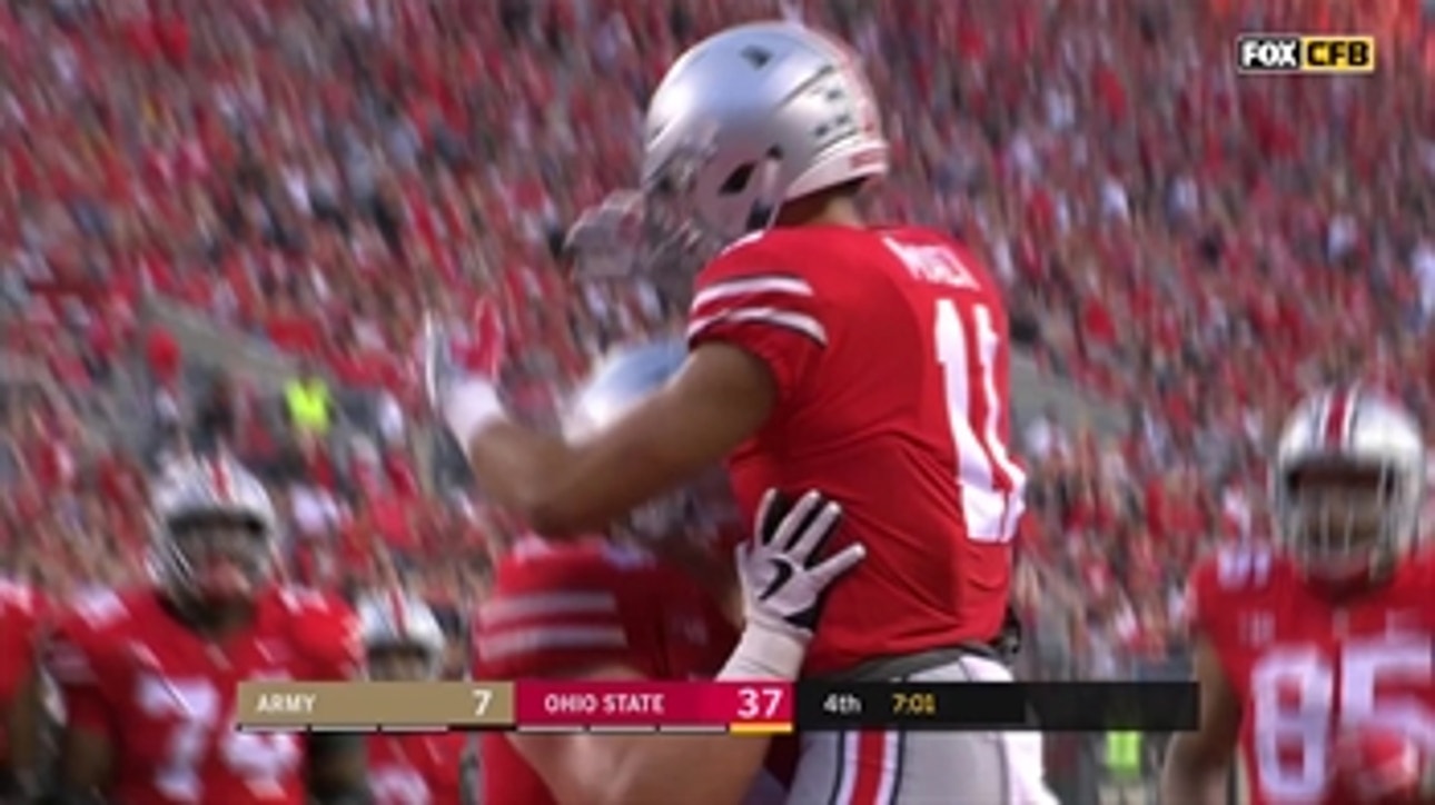 J.T. Barrett connects with Austin Mack for his 1st career touchdown reception