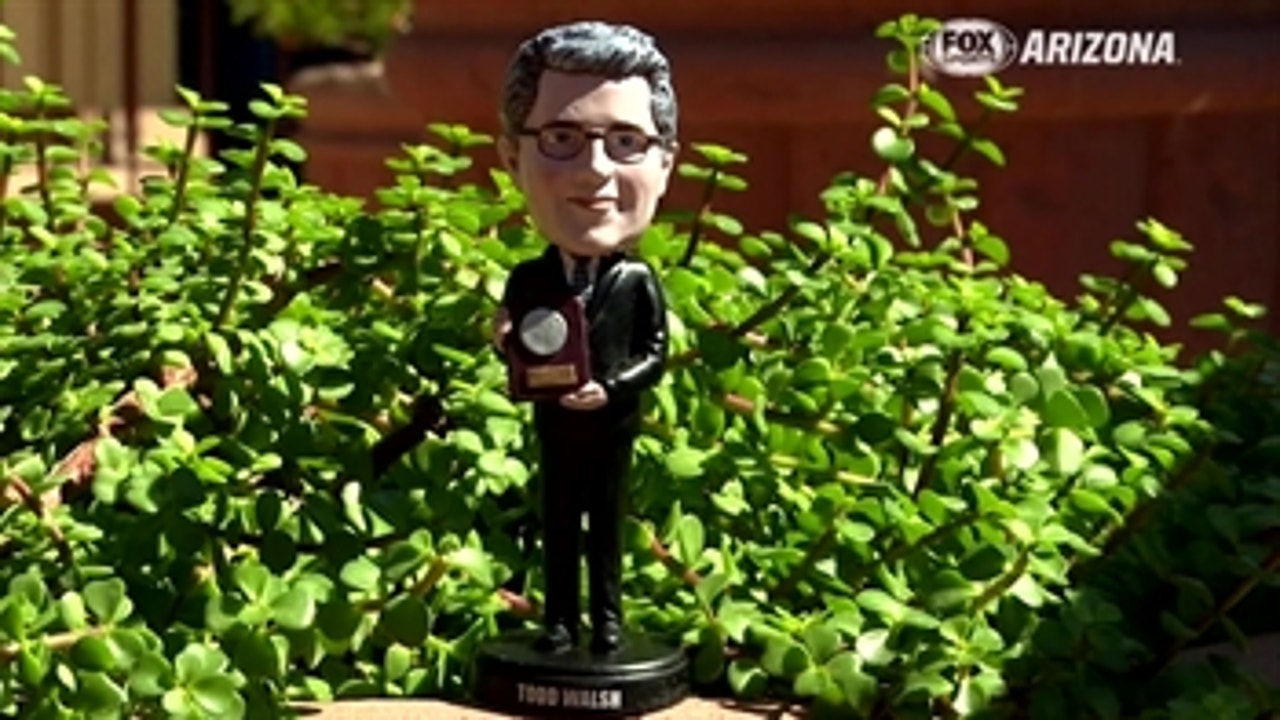Jody surprises Todd with his own bobblehead