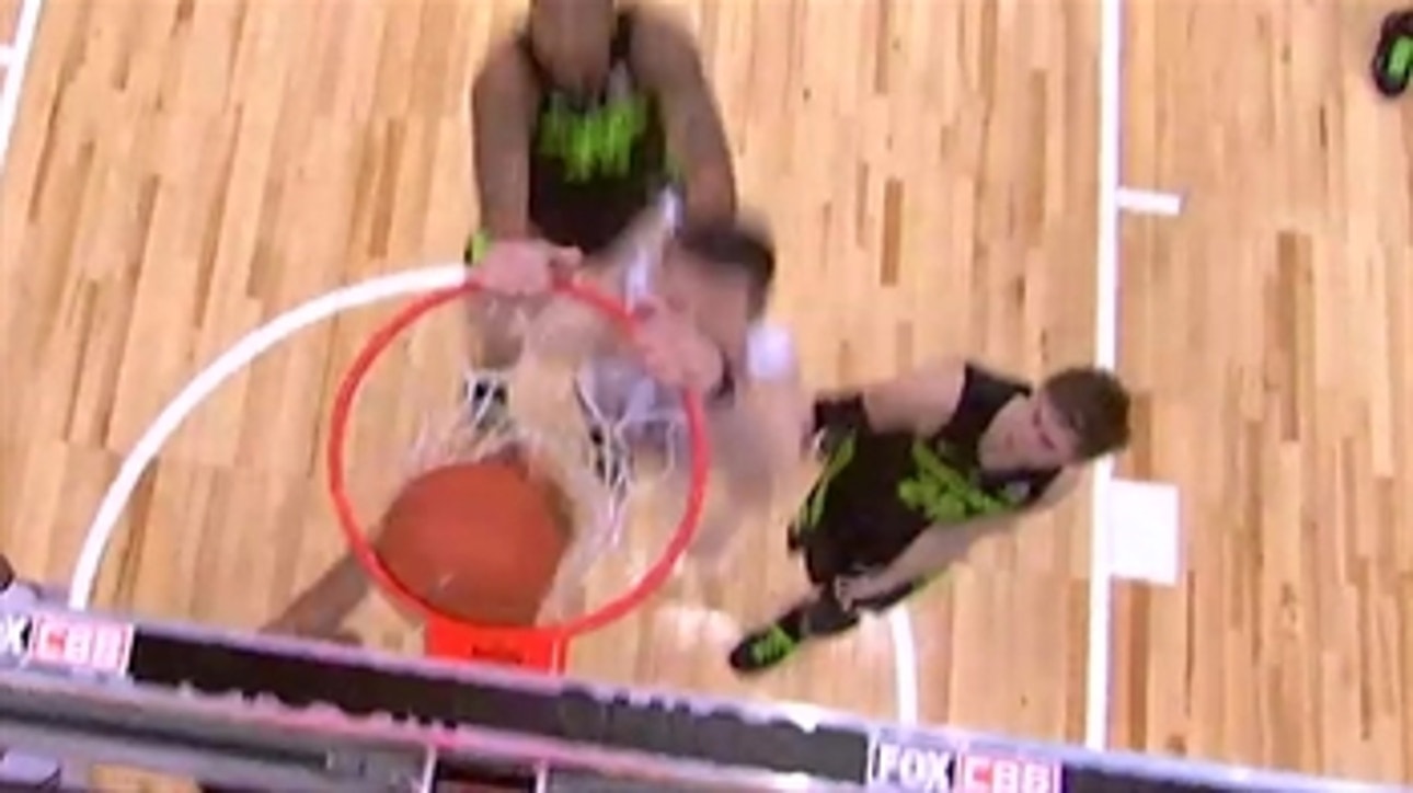 Ohio State's Kyle Young ties the game at 66 with a huge putback slam
