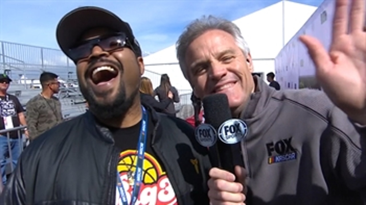 Kenny Wallace talks with Ice Cube before the race in California