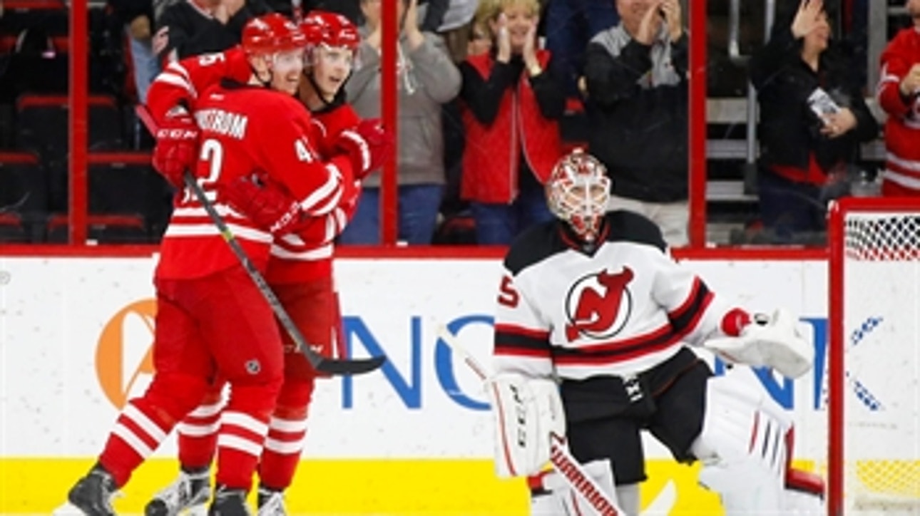 Two late goals push Hurricanes past Devils