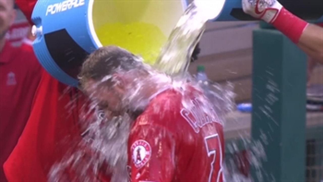 'That's never felt so good!' Zack Cozart gets a bath after first career walk off