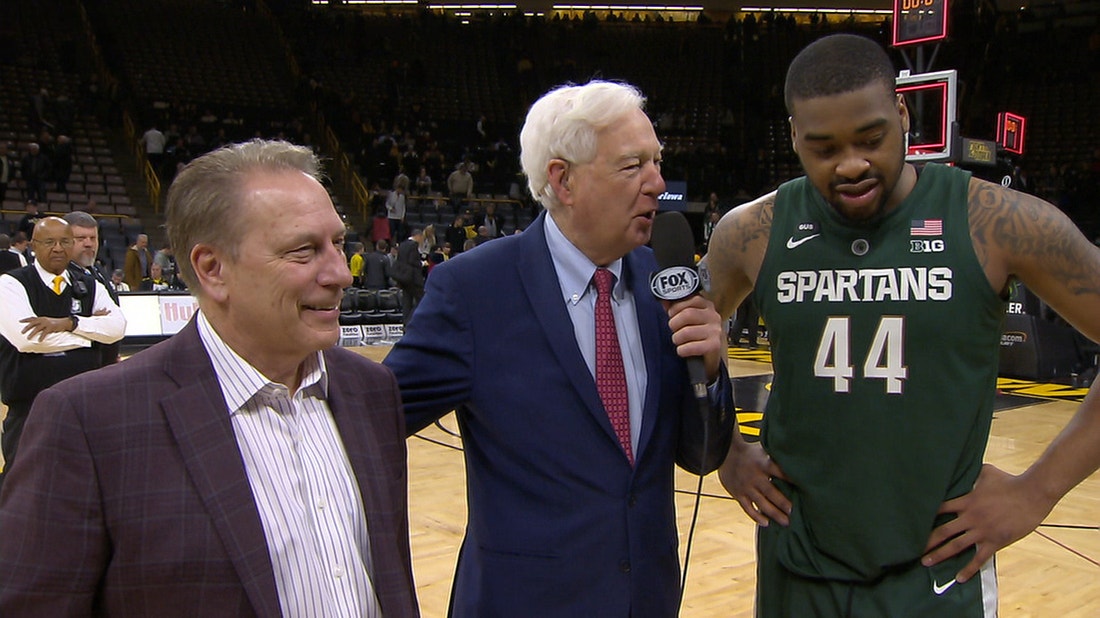 Bill Raftery talks with Nick Ward and Tom Izzo after Michigan State's win