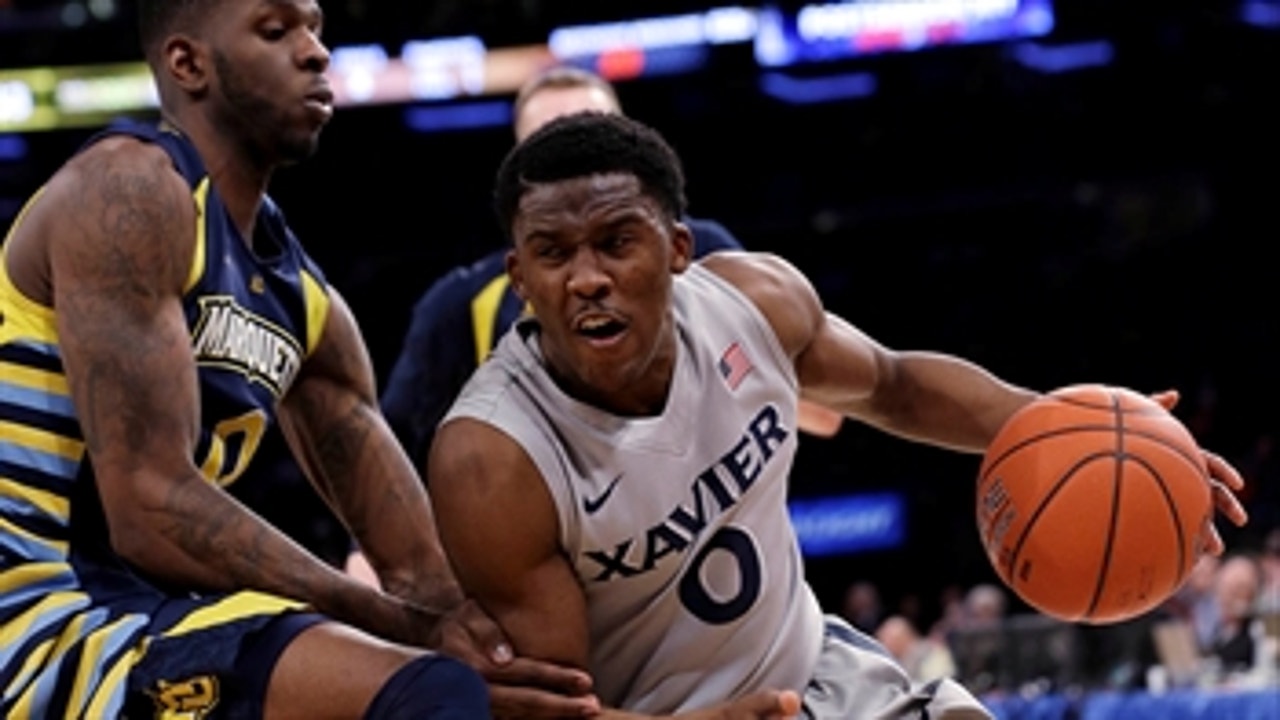 Xavier holds off Marquette to reach BIG EAST semis