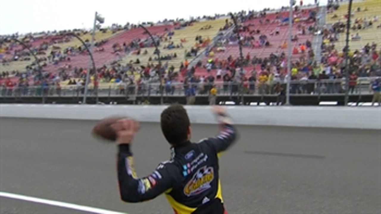 Bubba Wallace & Corey LaJoie play football with fans during rain delay at Michigan