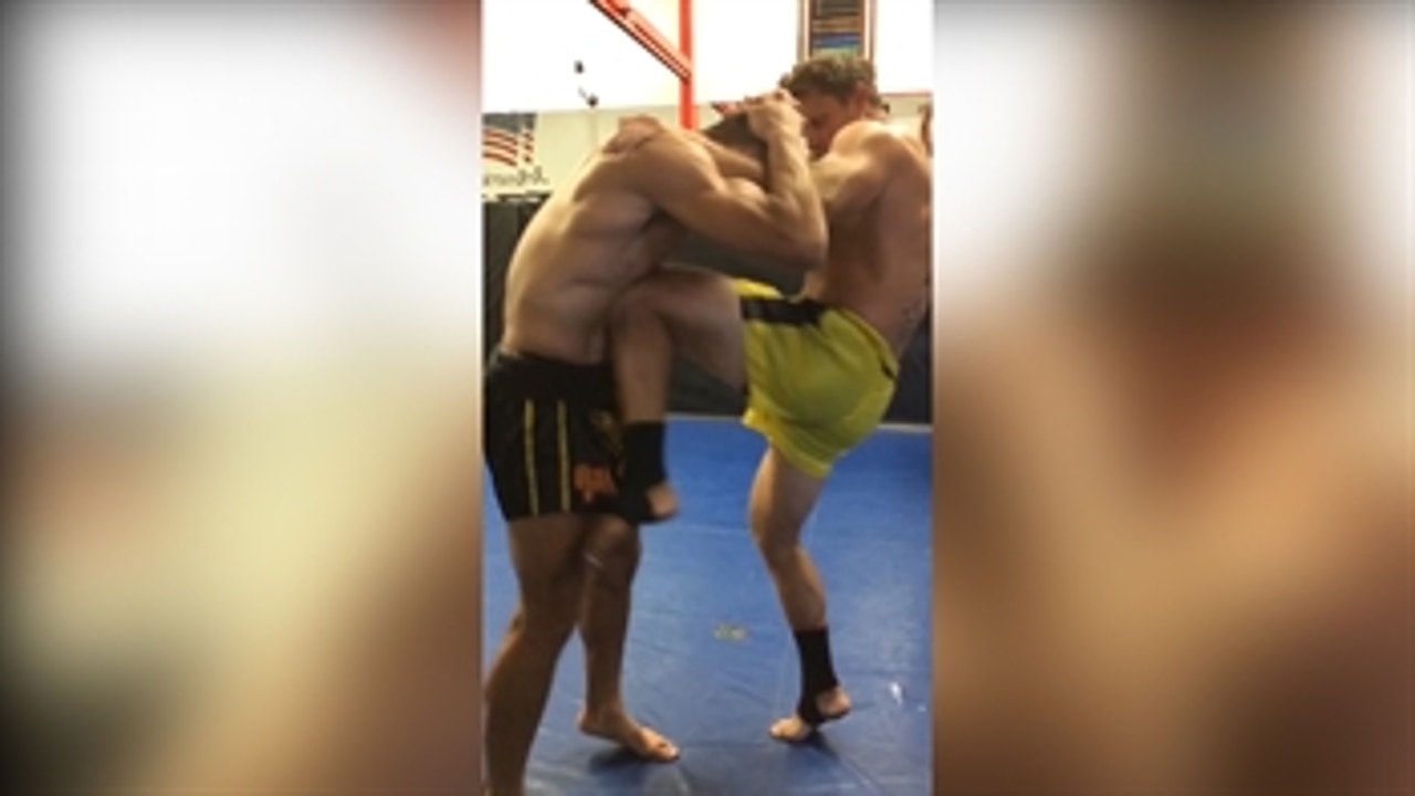 Muay Thai fighter works on his abs by getting kneed repeatedly in his
