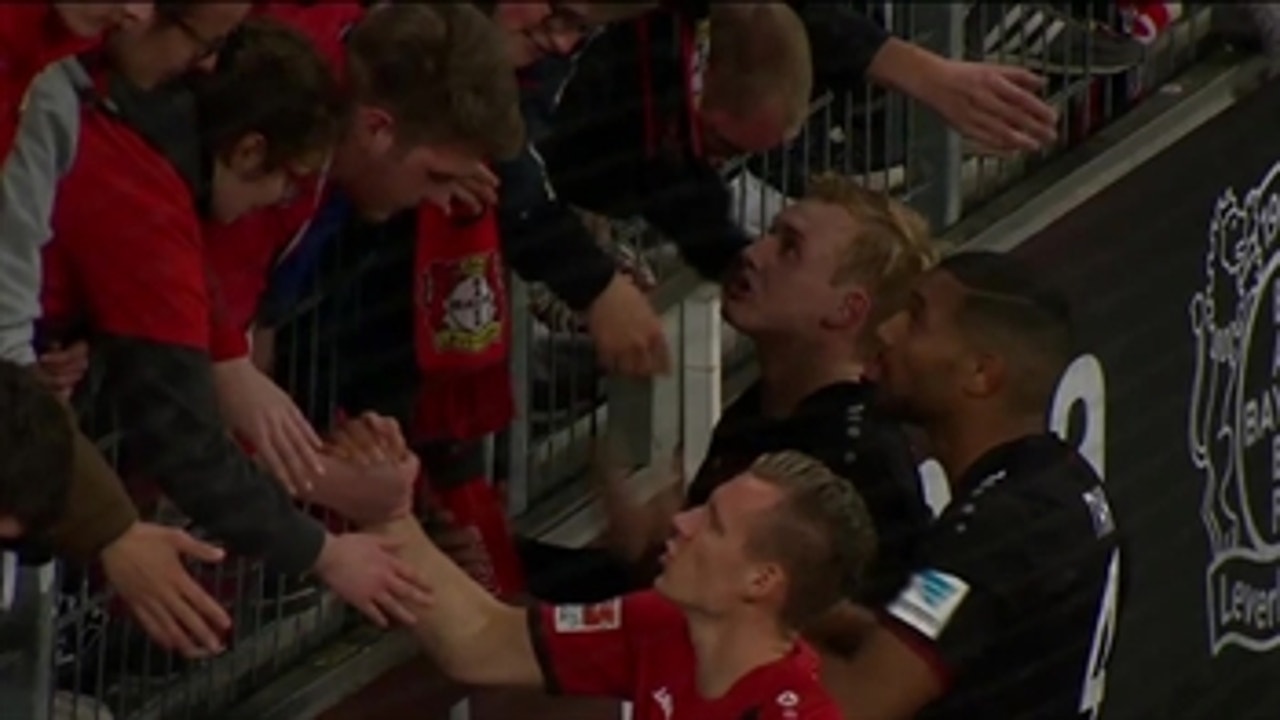 Bayer Leverkusen players met with the fans after their loss