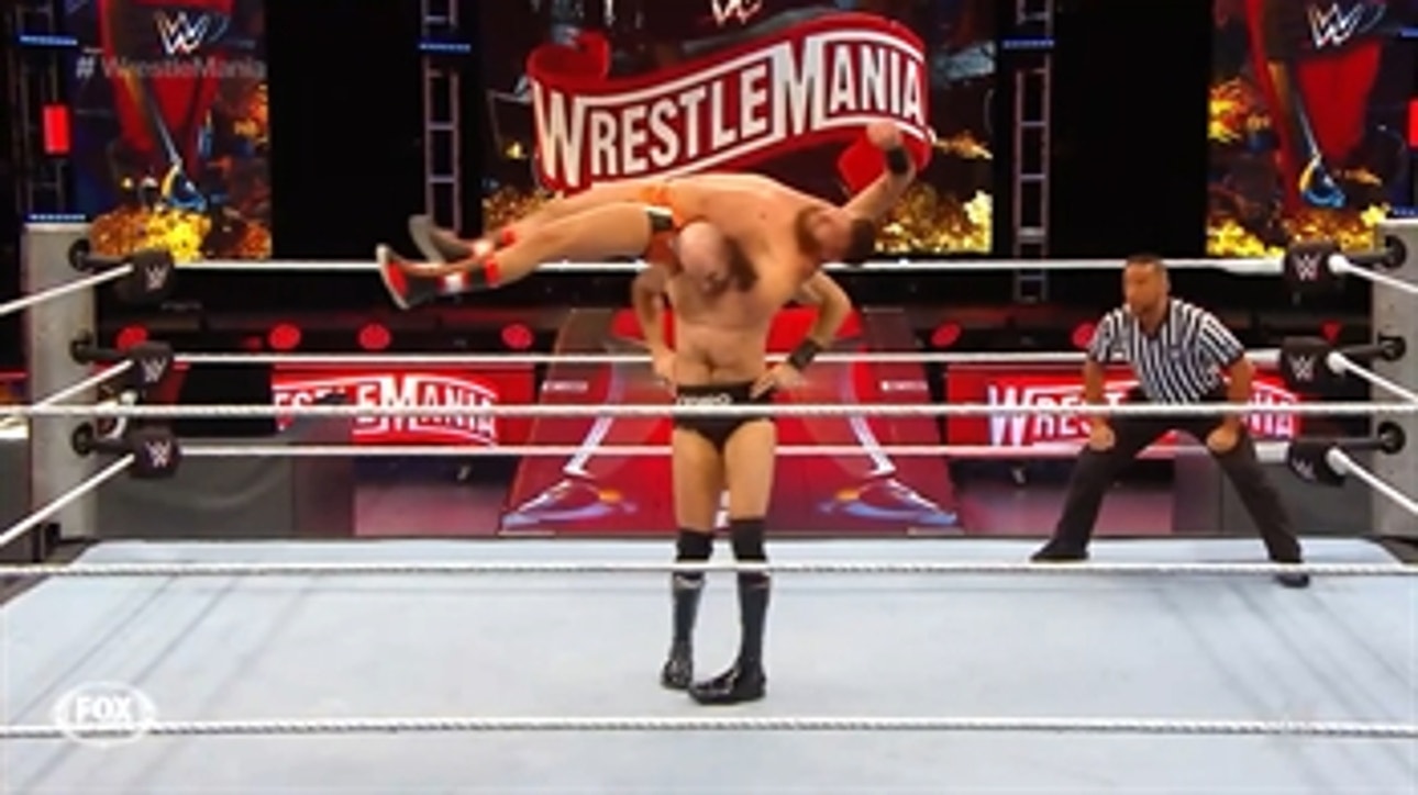 Cesaro takes down Drew Gulak with a no-hand airplane spin on the WrestleMania kick off show