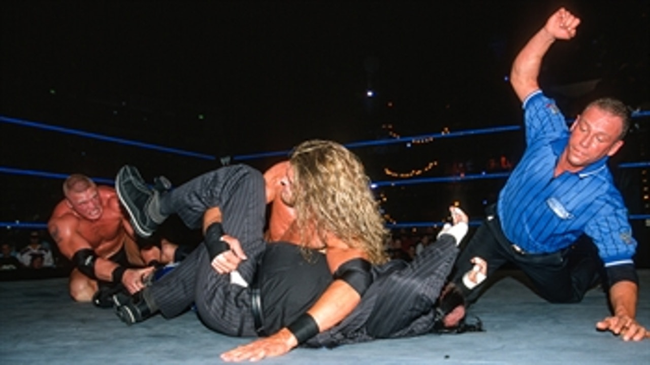 Edge faces Brock Lesnar & Paul Heyman in a Handicap Match: WWE Rebellion 2002