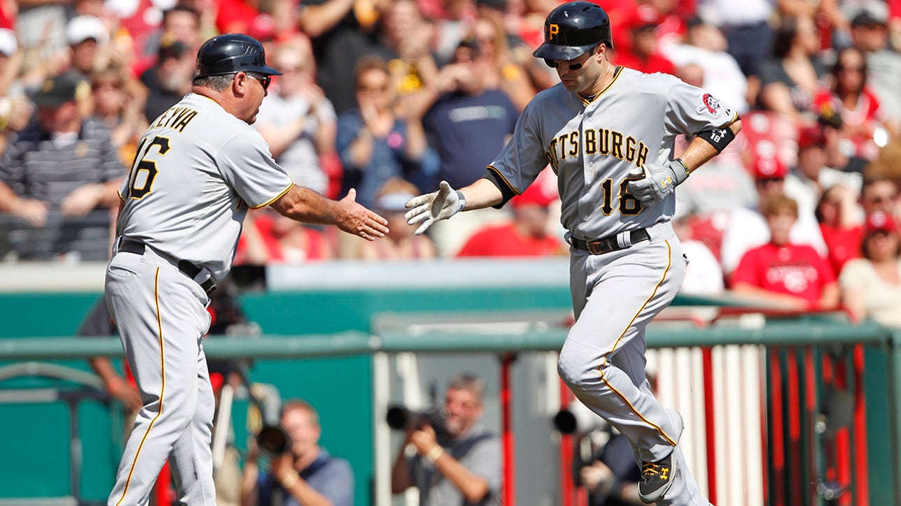 Walker powers Pirates past Reds